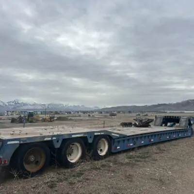 1985 50 TON TWAMCO FOLDING DECK TRIPLE AXLE TRAILER